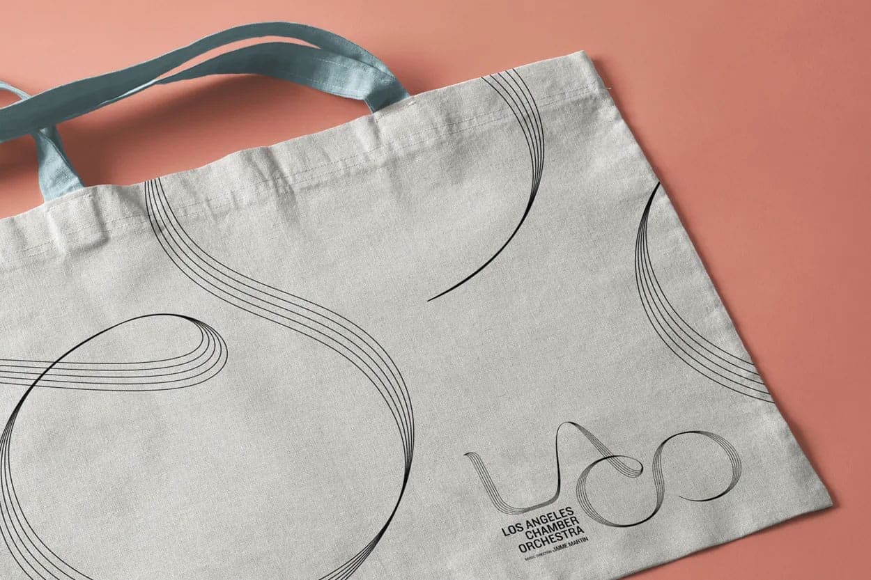 Canvas tote bag with the LACO logo and musical line graphics